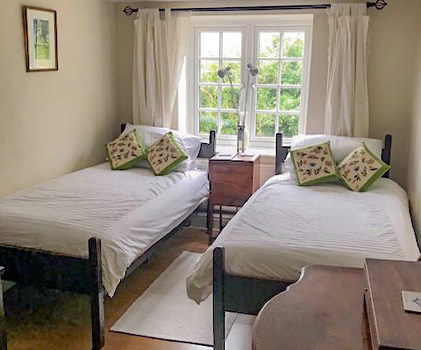 Interior photo of Church Cottage showing the twin second bedroom